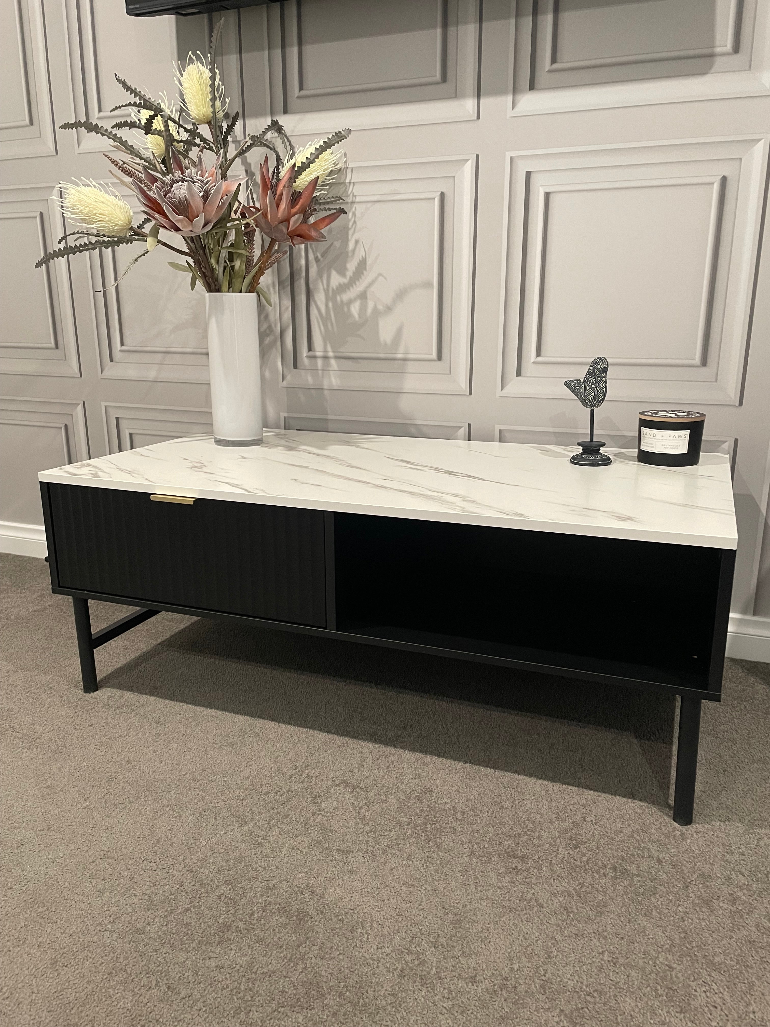 Modern Black Coffee Table with Fluted Front & Marble-Look Top – 110cm