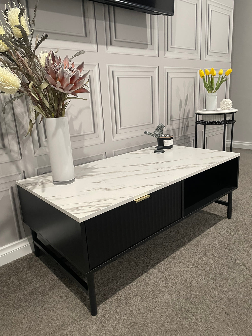 Modern Black Coffee Table with Fluted Front & Marble-Look Top – 110cm