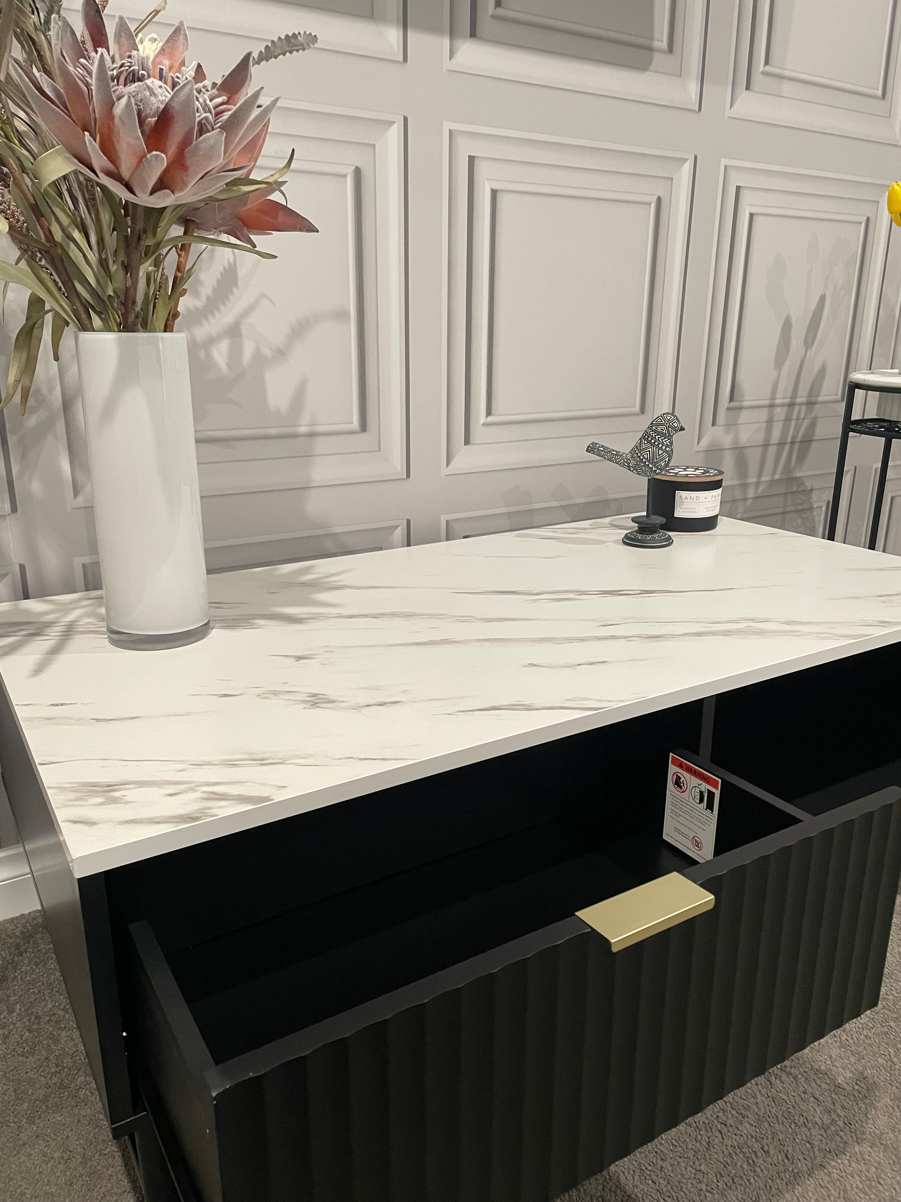 Modern Black Coffee Table with Fluted Front & Marble-Look Top – 110cm