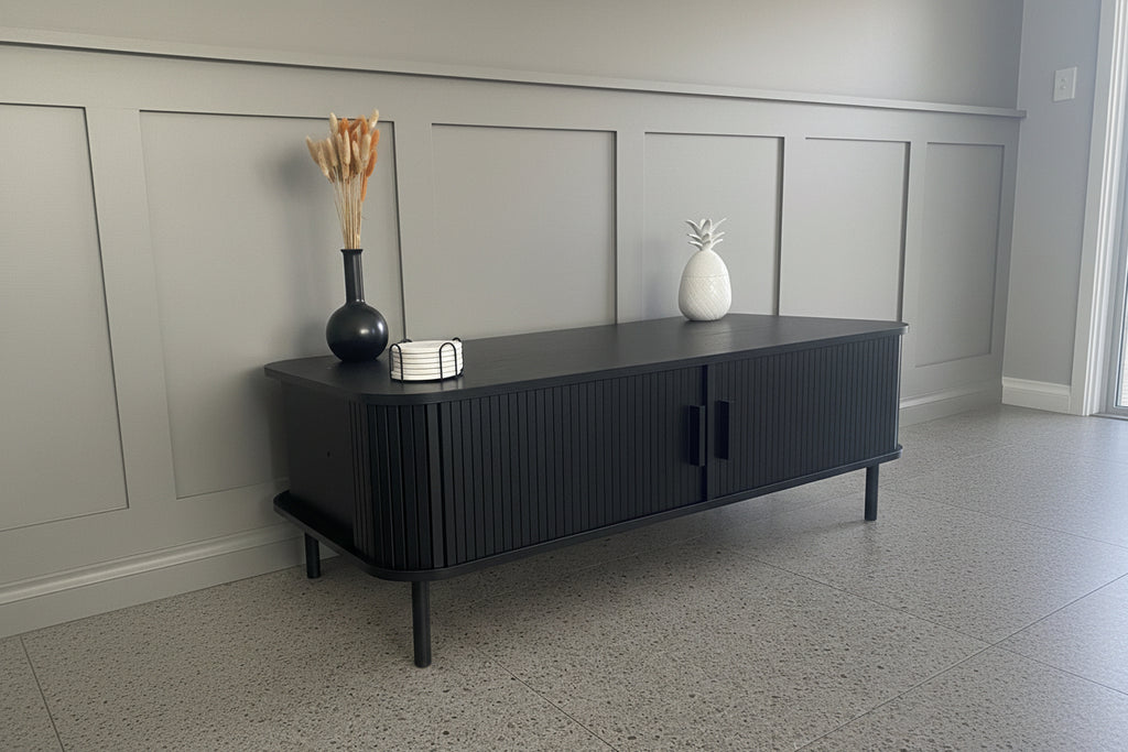 Modern Black Coffee Table with Sliding Fluted Doors – 120cm
