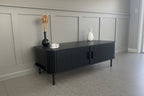 Modern Black Coffee Table with Sliding Fluted Doors – 120cm
