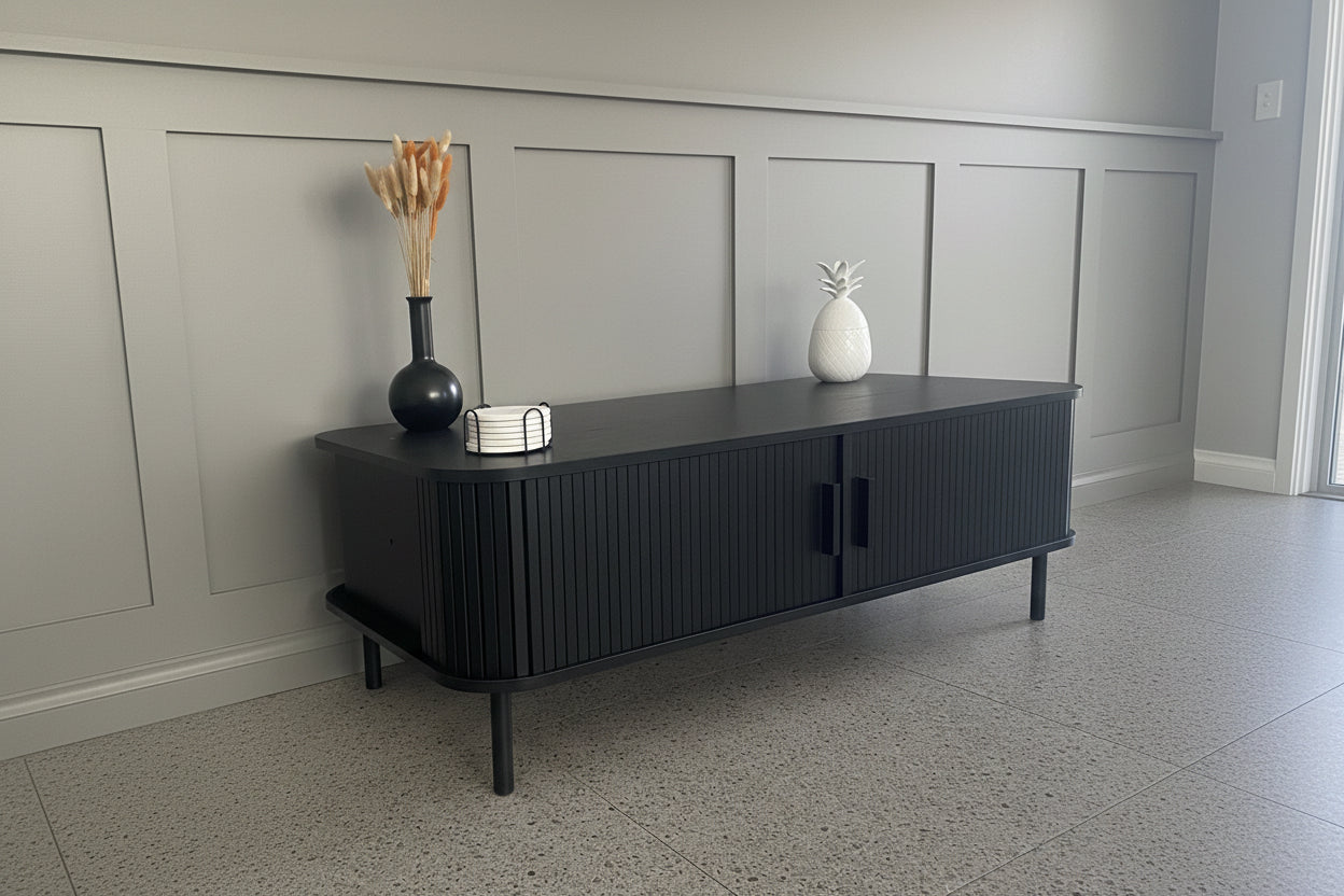 Modern Black Coffee Table with Sliding Fluted Doors – 120cm