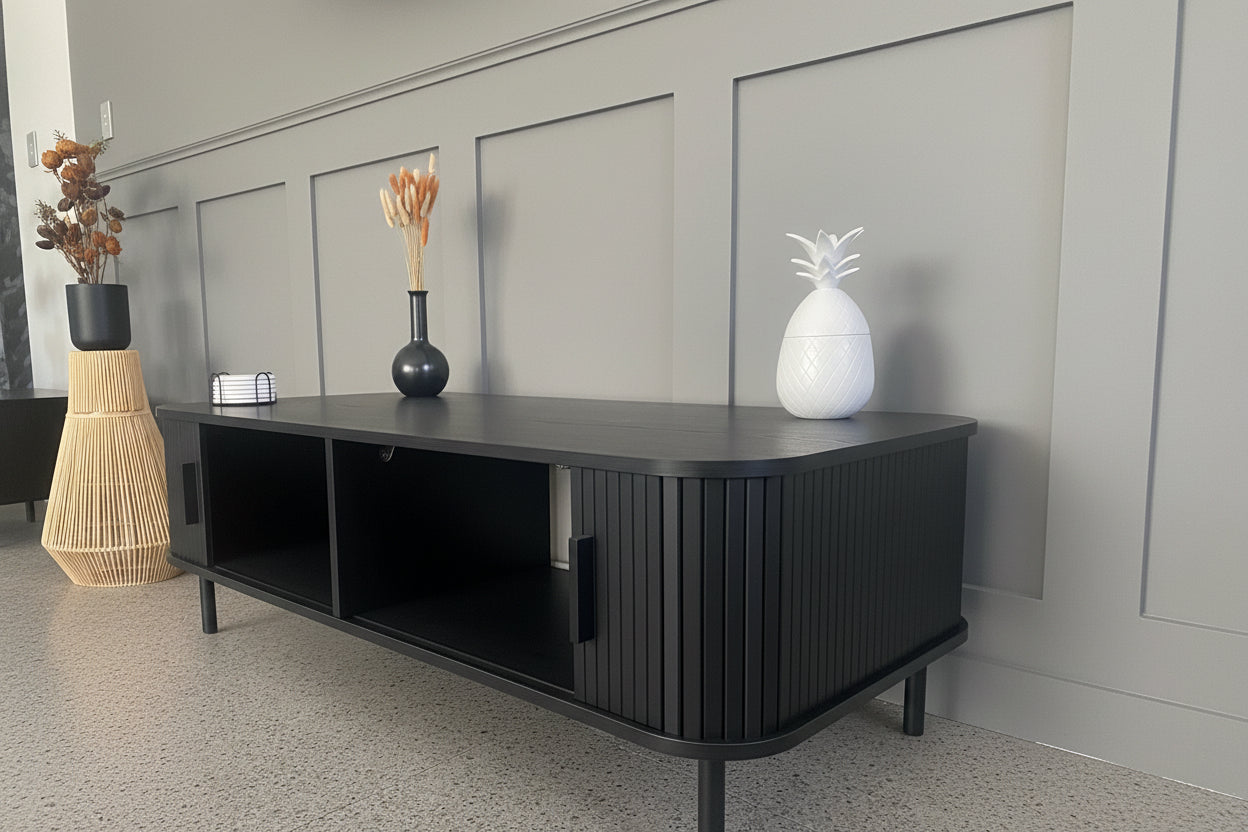 Modern Black Coffee Table with Sliding Fluted Doors – 120cm