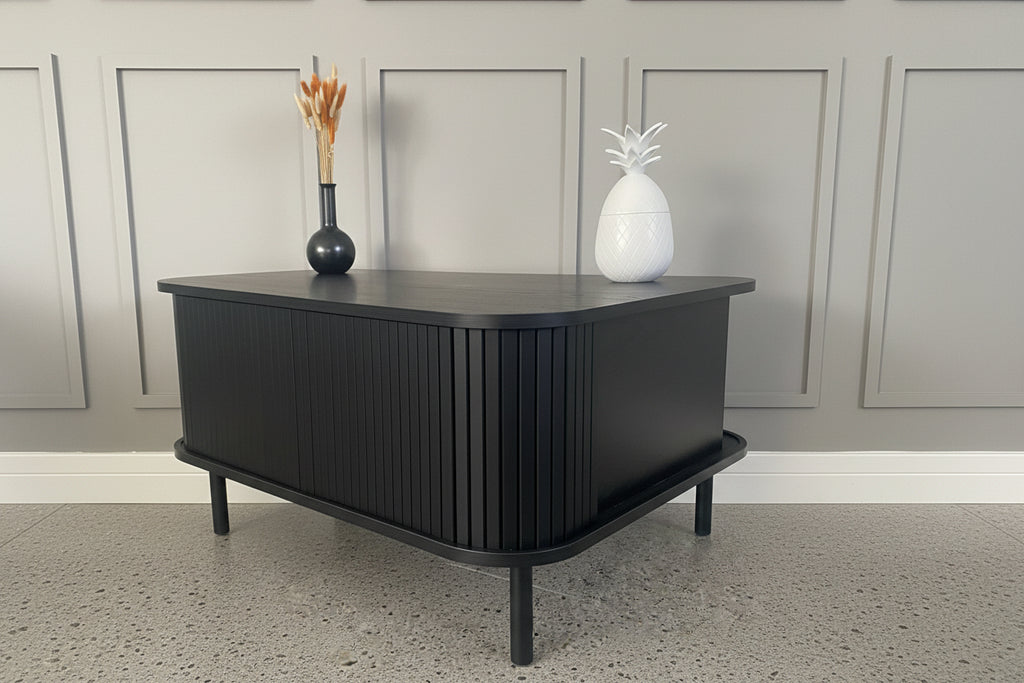 Modern Black Coffee Table with Sliding Fluted Doors – 120cm