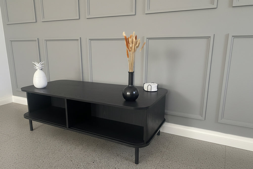 Modern Black Coffee Table with Sliding Fluted Doors – 120cm
