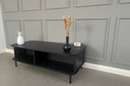 Modern Black Coffee Table with Sliding Fluted Doors – 120cm