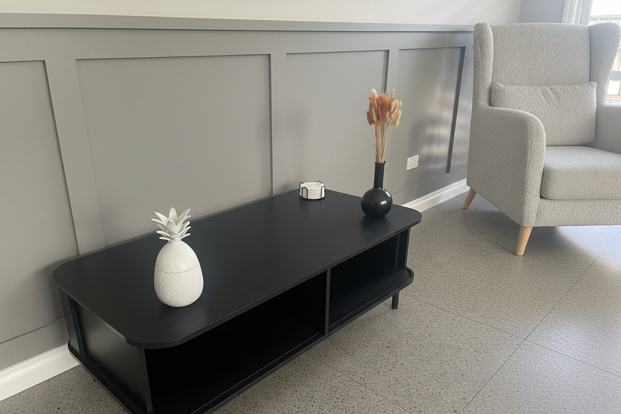 Modern Black Coffee Table with Sliding Fluted Doors – 120cm
